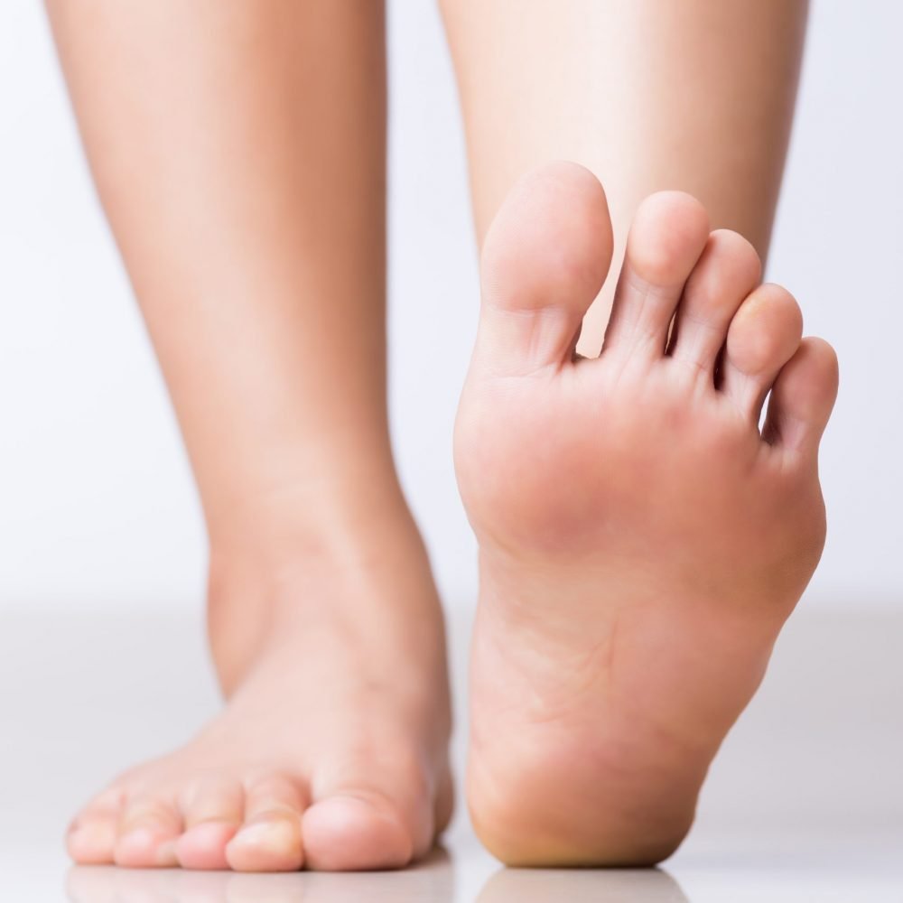 Closeup female foot pain, Healthcare concept.